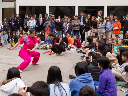 crowd of people watching a dance performance